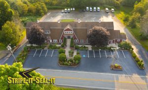 stripe-it-seal-it cm Minkler Keene NH Sealcoating Parking Lots and Driveways