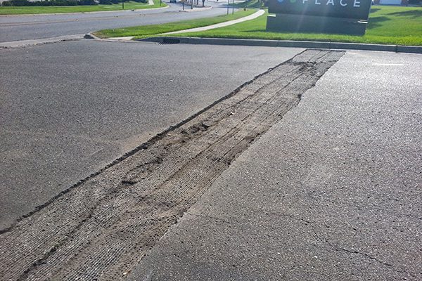 asphalt patch repair, parking lot, by stripe it seal it keene nh